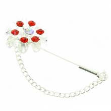 Broche fleur à strass avec une chaînette argentée