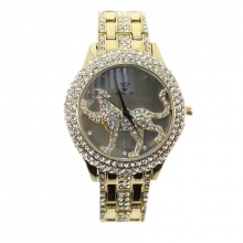 Montre dorée incrustés de strass avec motif léopard