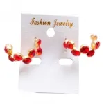 Boucles d'oreilles ornées de pierres précieuses