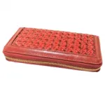 Portefeuille zippé avec motif tressé