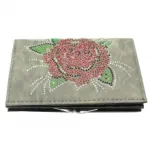 Portefeuille clouté avec motif  rose à perles