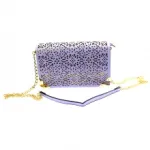 Sac à bandoulière moitié chaîne dorée avec motif perforé