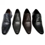 Chaussures de ville ornées de perforation