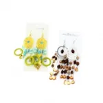 Boucles d’oreilles pendantes fantaisie ornées de perles